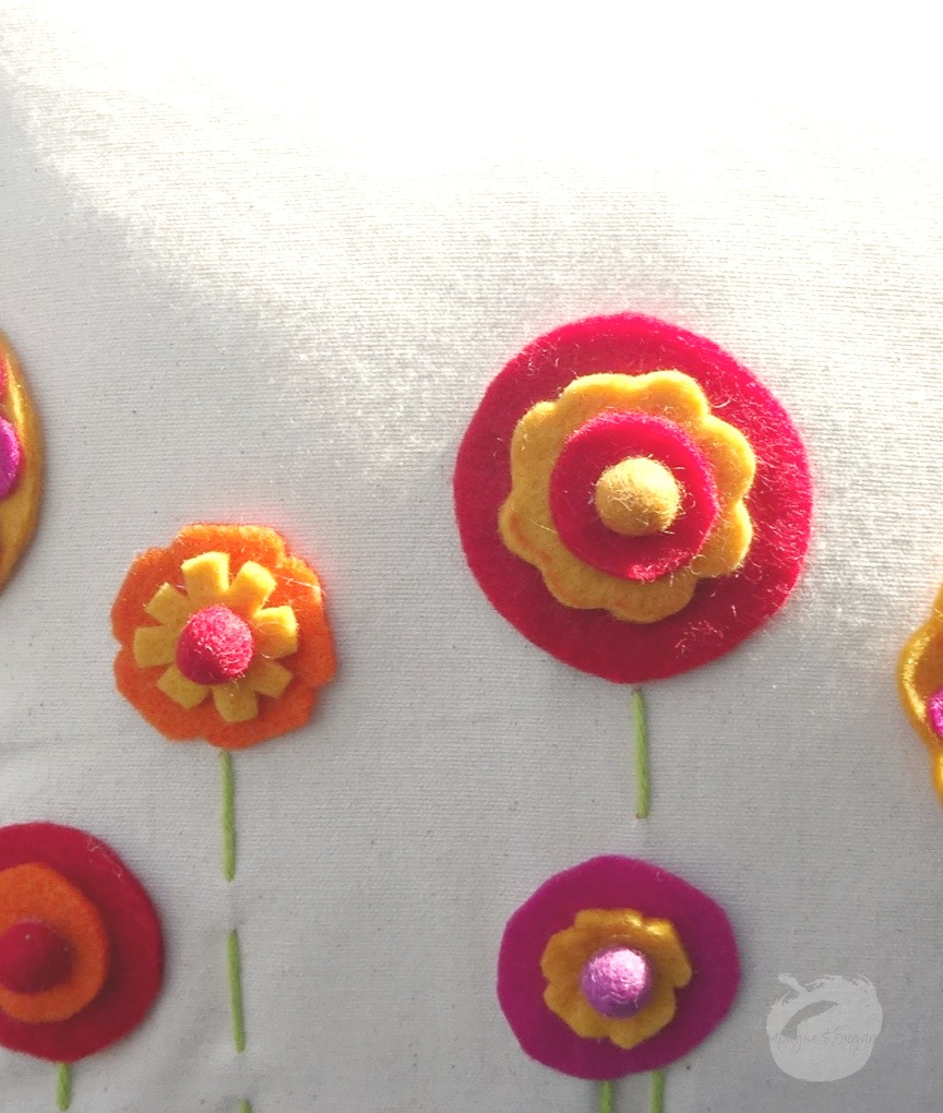 A close up of the finished felt flowers by Champagne and Sugarplums 