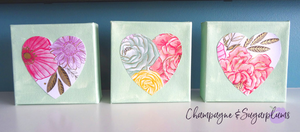 Three completed floral triptych canvases with paper hearts by Champagne and Sugarplums