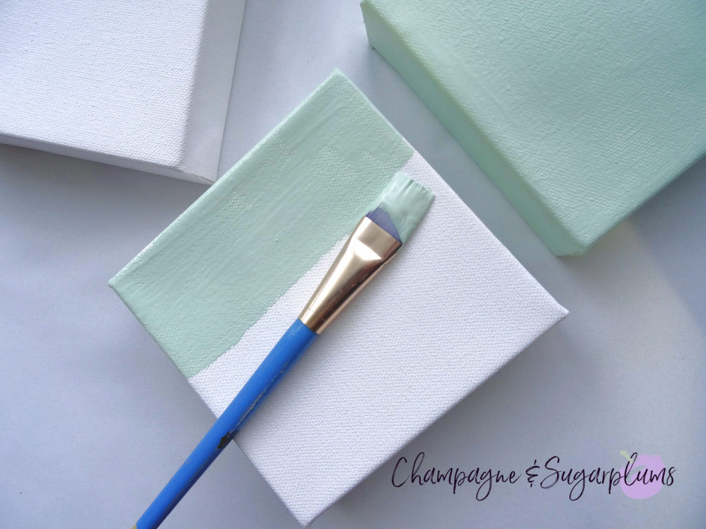 Painting three small canvases in mint by Champagne and Sugarplums