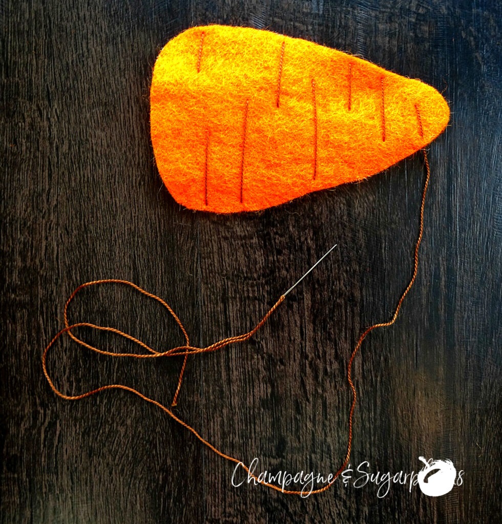 How to sew lines in felt carrot with embroidery thread by Champagne and Sugarplums