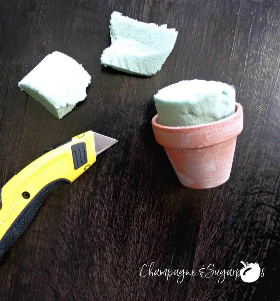 How to put floral foam into a mini clay pot by Champagne and Sugarplums
