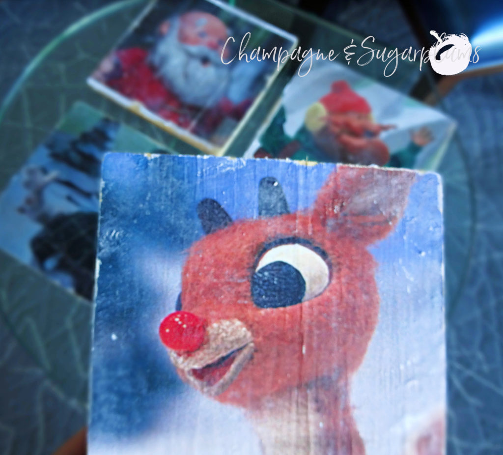 Retro inspired decoration with four characters, close up of Rudolph by Champagne and Sugarplums