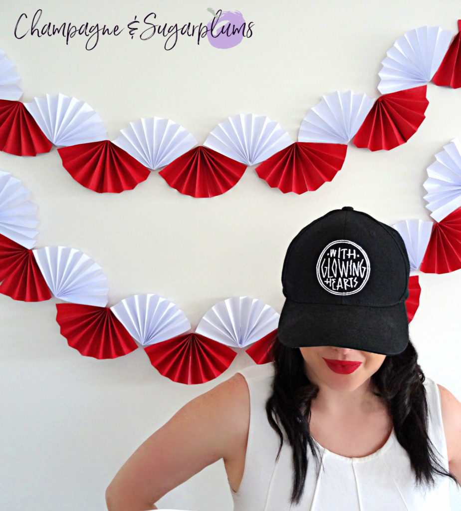 Canada Day Paper Garland on a white wall by Champagne and Sugarplums