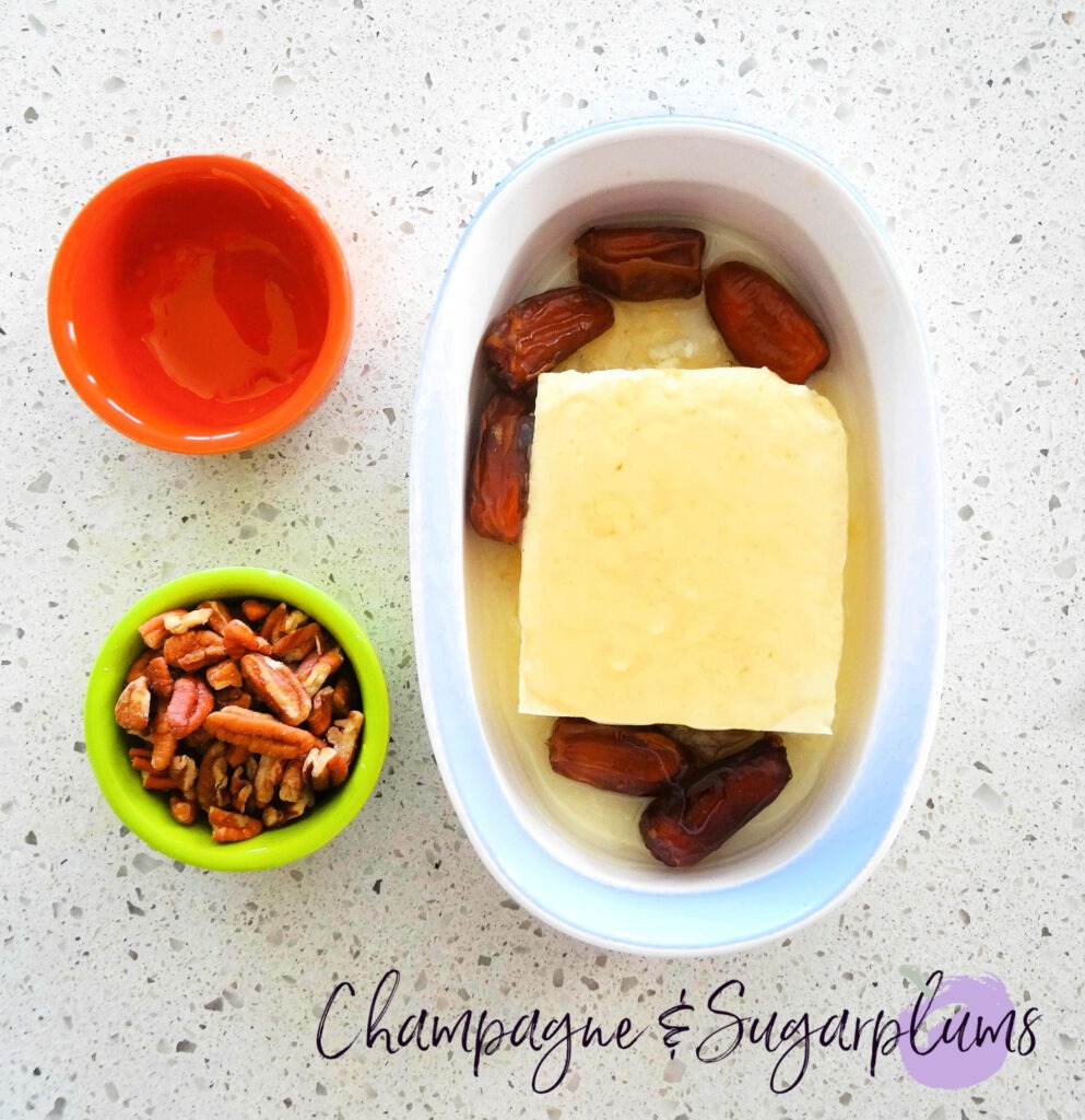 Adding dates to Feta Cheese Appetizer by Champagne and Sugarplums