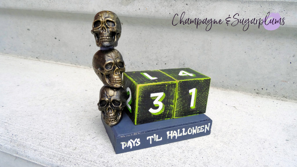 Halloween advent skull advent on a white concrete background by Champagne and Sugarplums