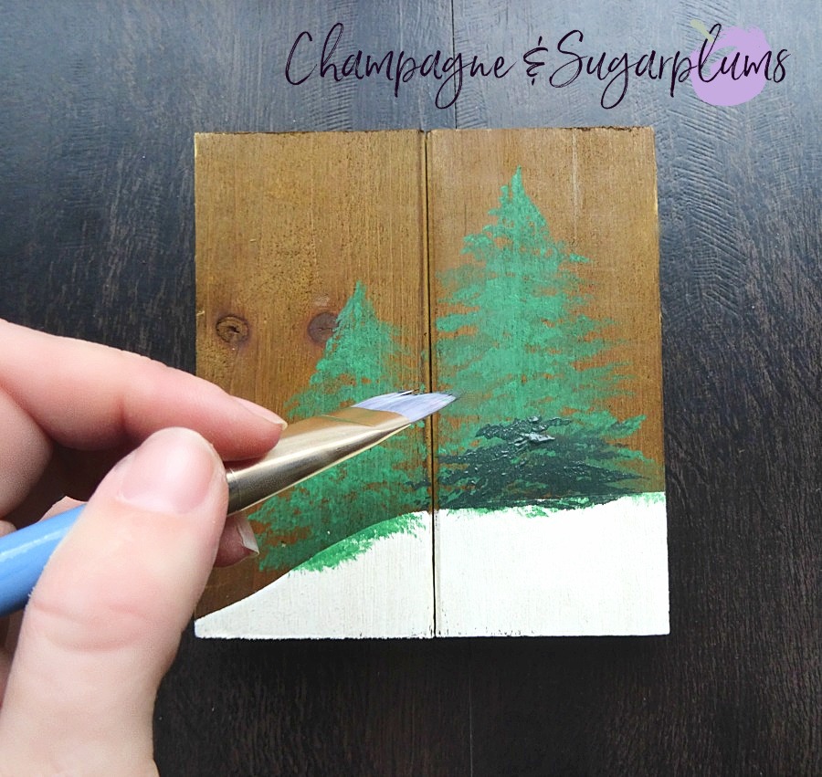 Painting dark green over light green trees by Champagne and Sugarplums