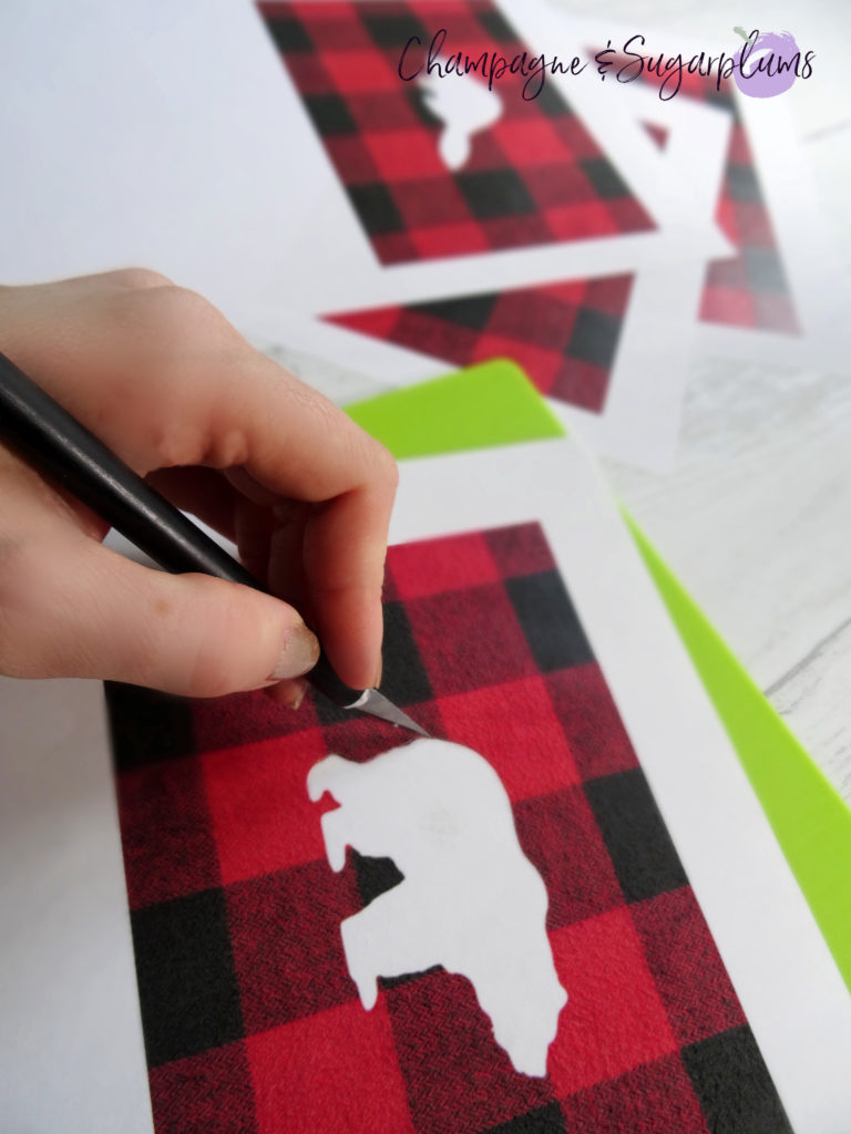 Cutting a bear shape out of paper with a craft knife by Champagne and Sugarplums