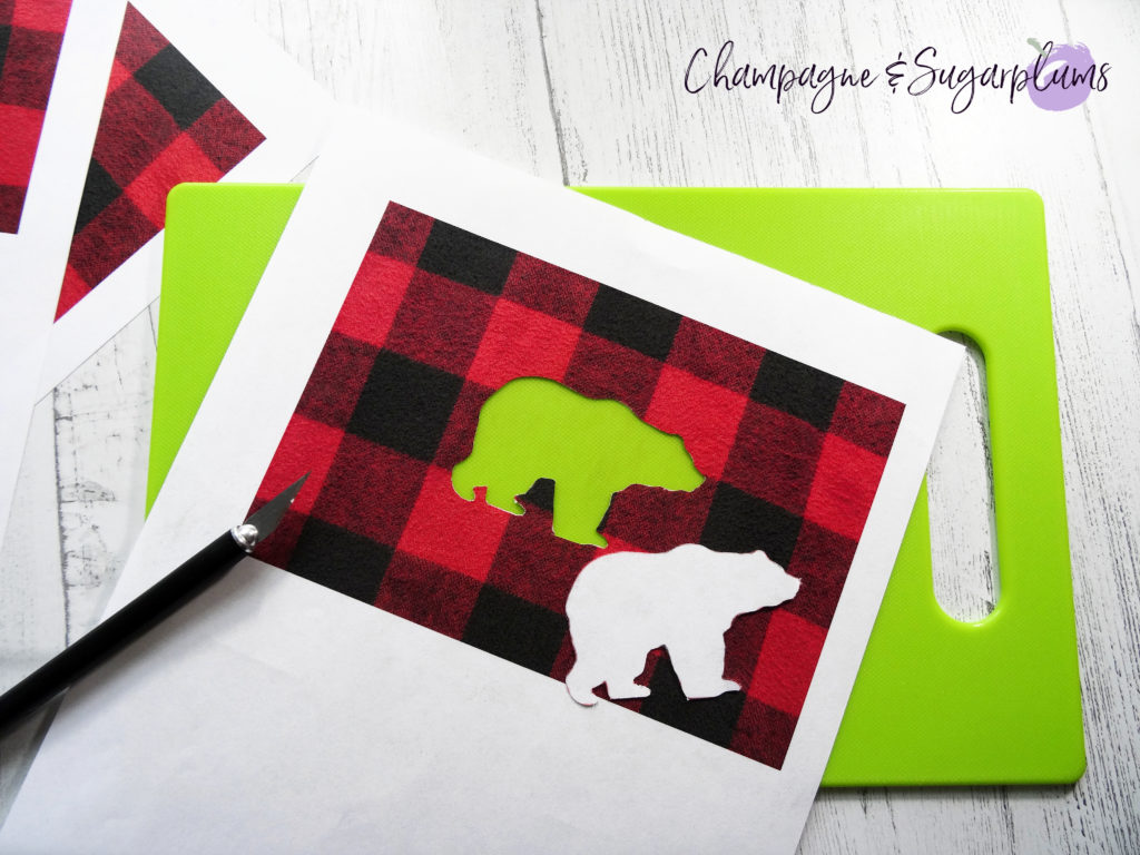 Cutting a bear shape out of paper with a craft knife by Champagne and Sugarplums