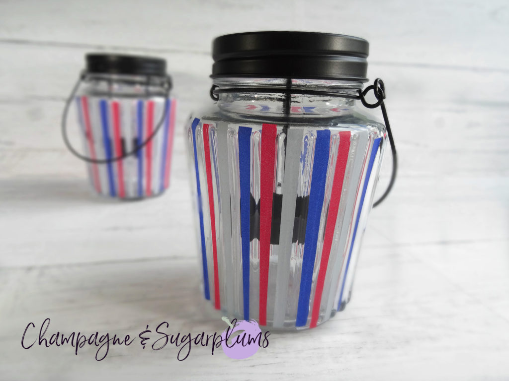 Fourth of July Celebration Candles by Champagne and Sugarplums