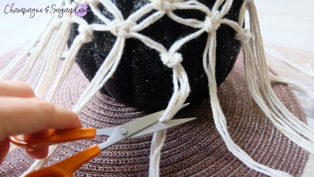 Cutting the ends of the Macrame by Champagne and Sugarplums