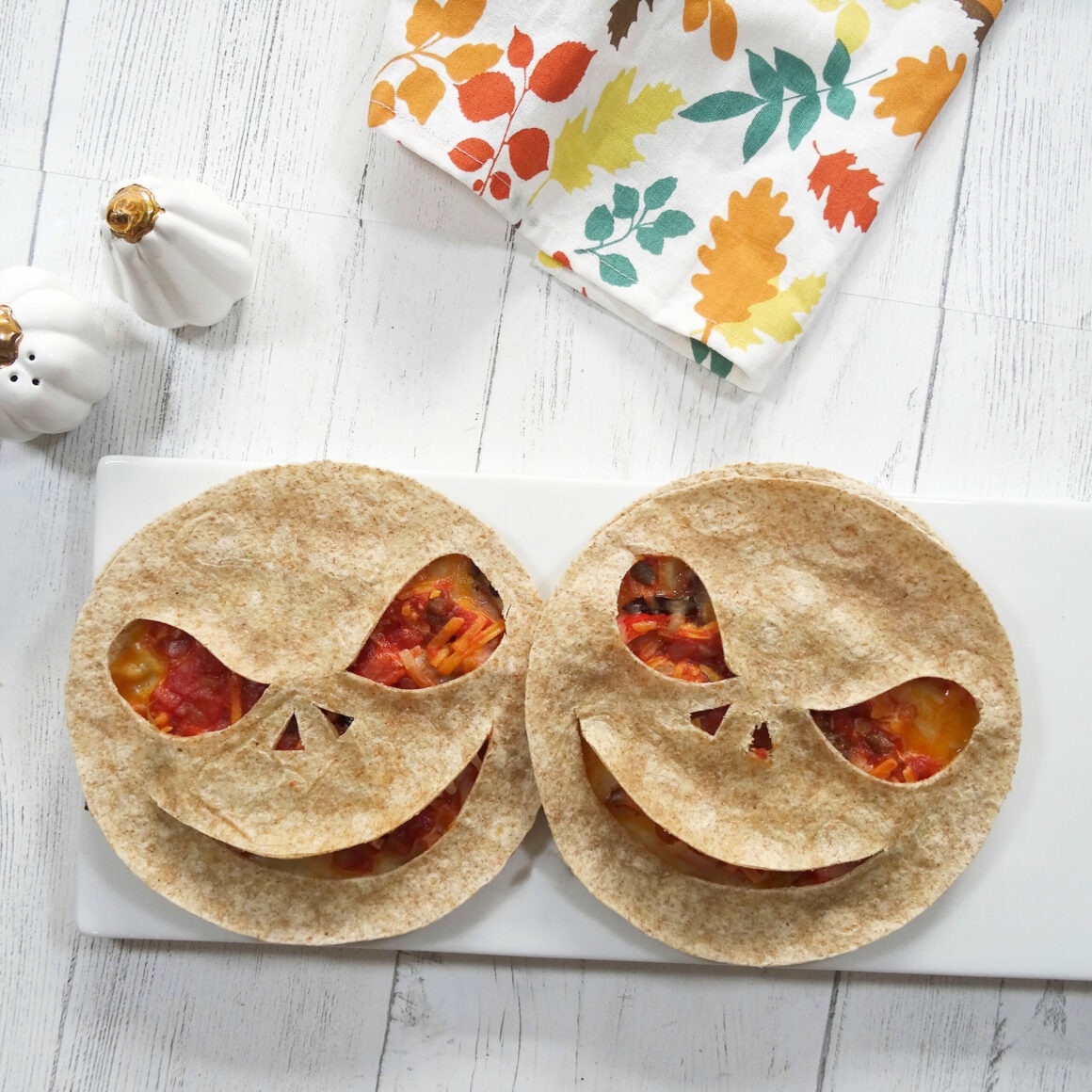 Creepy Quesadillas on a white plate by Champagne and Sugarplums