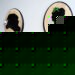Three oval wood plaques with silhouettes of Santa, Mrs. Claus and Rudolf on a white background by Champagne and Sugarplums