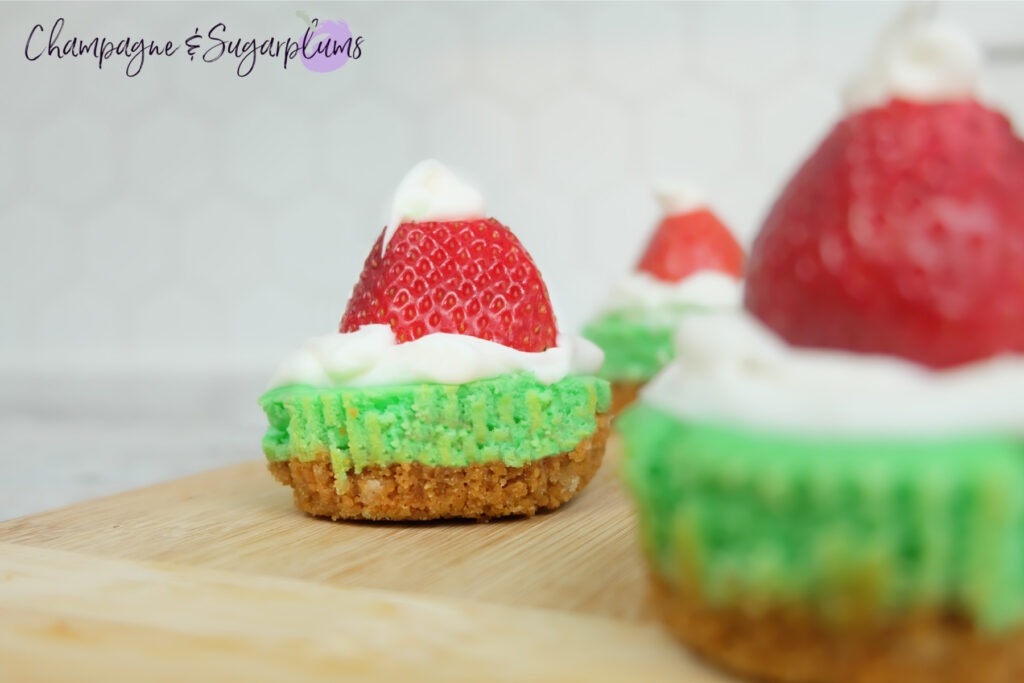 Festive and Fun Grinch Mini Cheesecakes by Champagne and Sugarplums