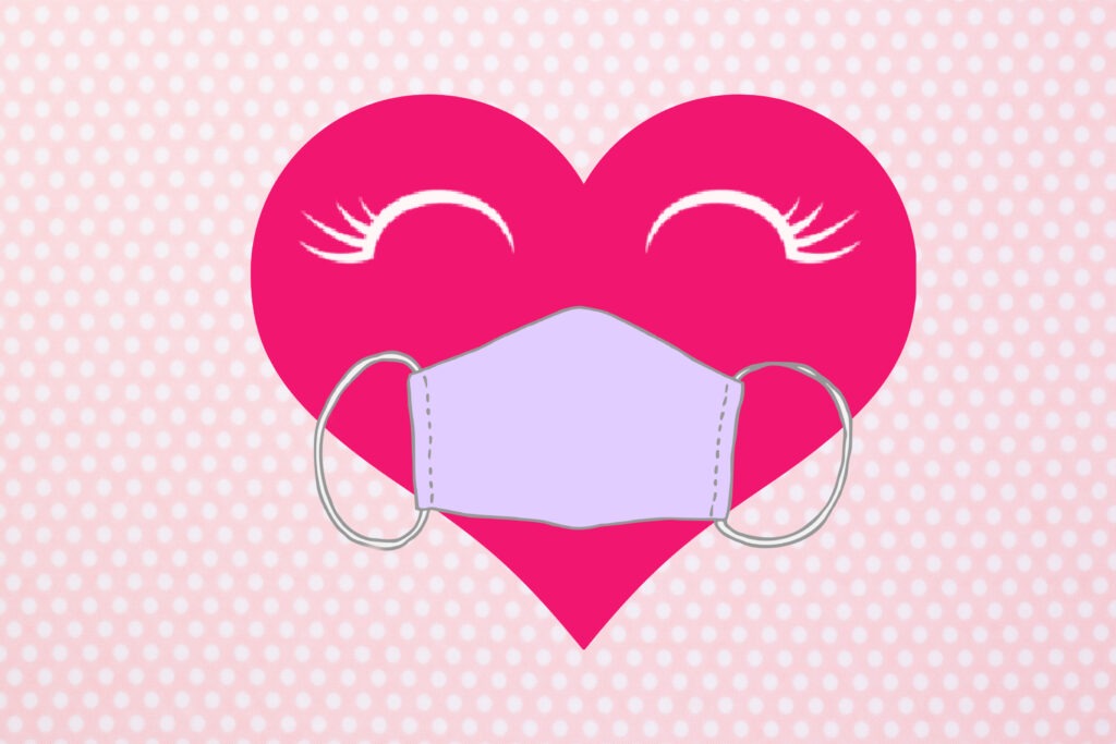 Free printable COVID themed pink dotted Valentine card with a heart wearing a mask on it by Champagne and Sugarplums