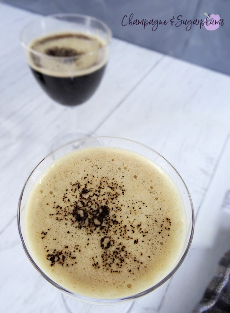 Top view of an Espresso Martini on a white and grey background by Champagne and Sugarplums