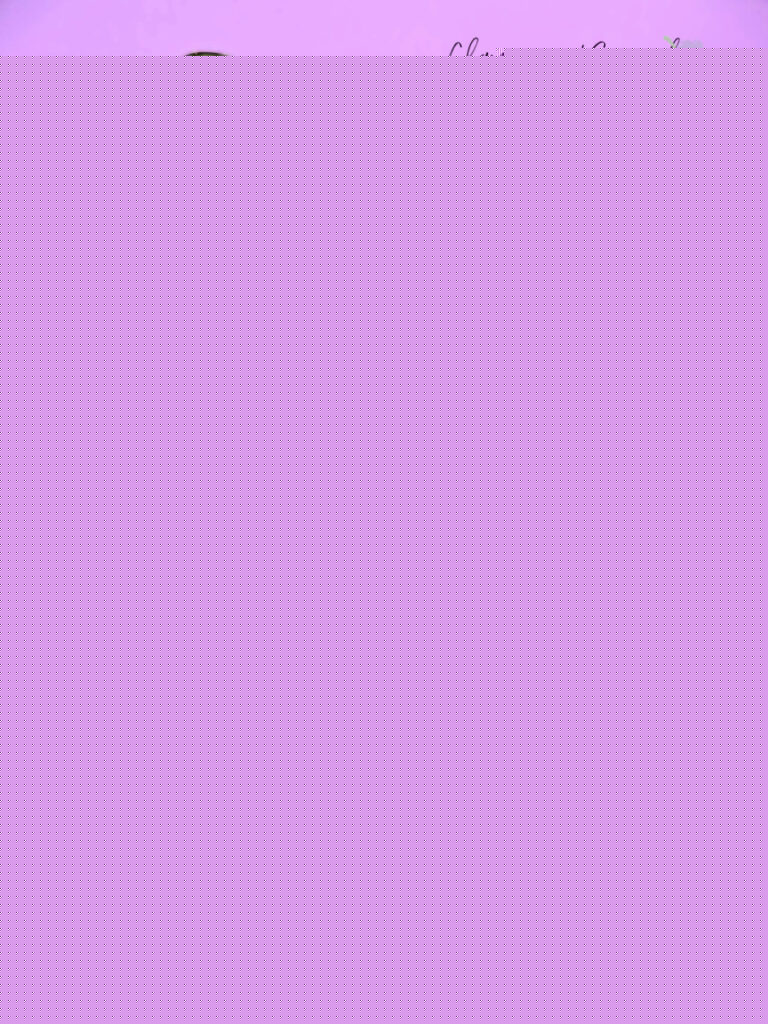 Mixing a cocktail, using blue curacao and champagne in a Nick and Nora glass on a white and purple background by Champagne and Sugarplums