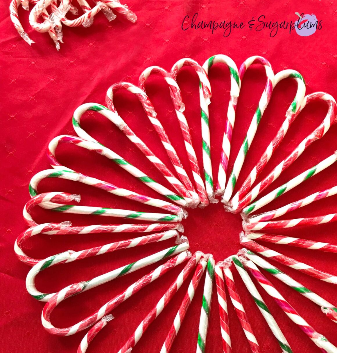 candy cane wreath by champagne and sugarplums