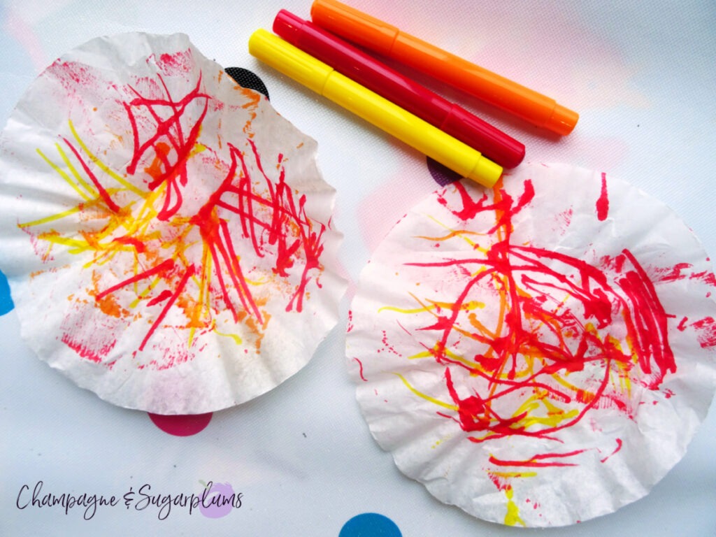 Coloured coffee filters with red and orange markers by Champagne and Sugarplums